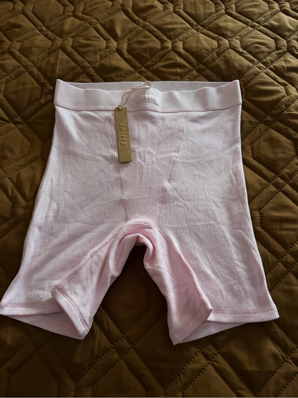 SKIMS Pale Pink Ribbed Bike Shorts